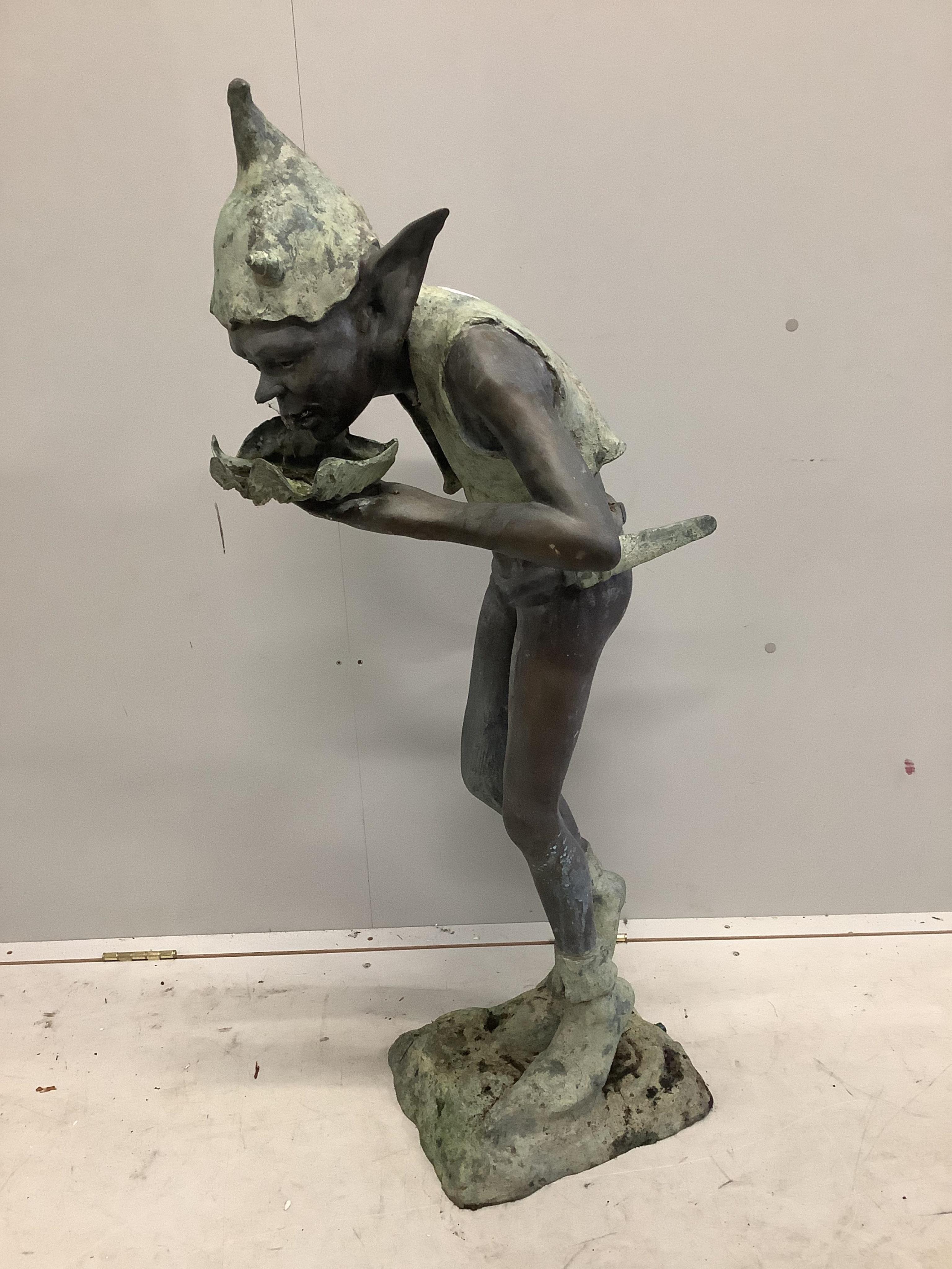 In the Manner of David Goode, a bronze garden sprite fountain, height 116cm. Condition - fair